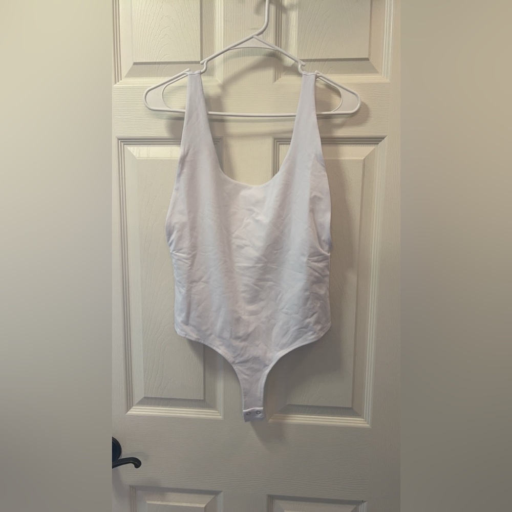 ReoRia white leotard
